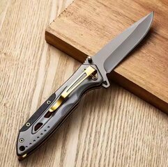 Zakmes met Titanium coating  en gouden tinden.